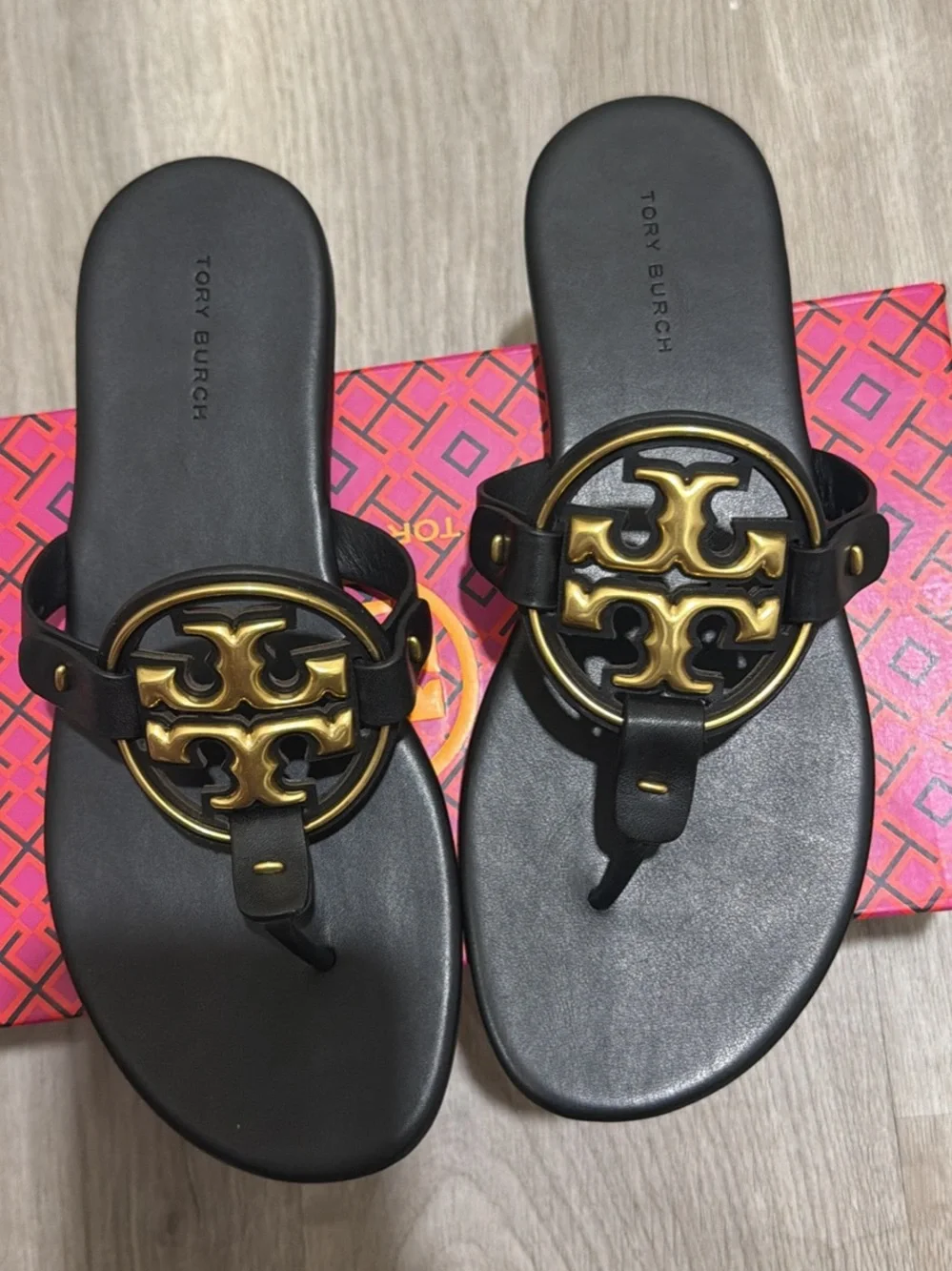Tory Burch Black Leather Sandals with Gold Logo Medallion